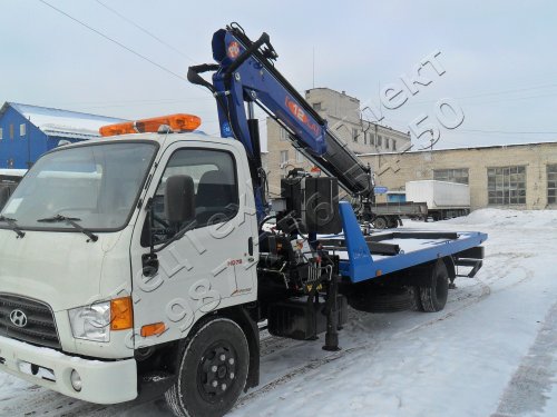 Автоэвакуатор на базе HYUNDAI 78 со сдвижной платформой краном манипулятором и Брилем ( устройством частичной погрузки )